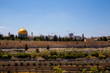 Jerusalem, Israel - 27 april 2021: the dome of the rock outside the wall of the old city and gold...