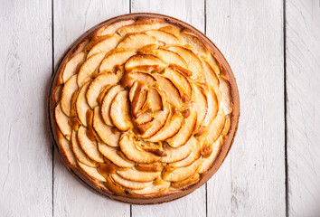 Apple pie, delicious pastry dessert with slices of apple on top