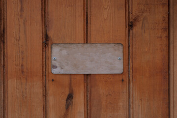 wood sign on wood plank background