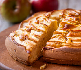 Naklejka na ściany i meble Apple pie, delicious pastry dessert with slices of apple on top