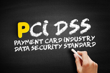 PCI DSS - Payment Card Industry Data Security Standard acronym, IT Security concept on blackboard.