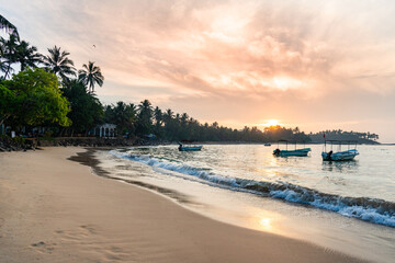 Sunrise over tropic beach in Sri Lanka