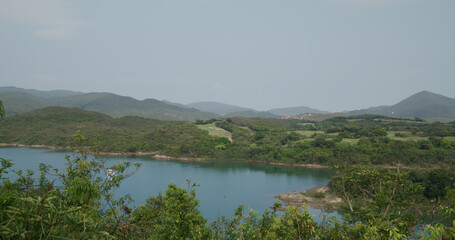 Fototapeta premium Mountain and island with golf club