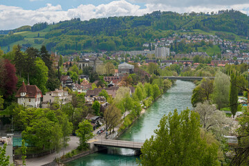 Fototapeta na wymiar View of the Are river and mountain Gurten in Bern, Switzerland