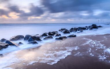 seascape beach view long exposure cloudy