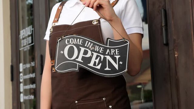 Hand'S Female Holding Open Sign In Cafe 