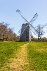 Fototapeta na wymiar Shingled smock windmill at the Prescott Farm historic site in Middletown, Rhode Island