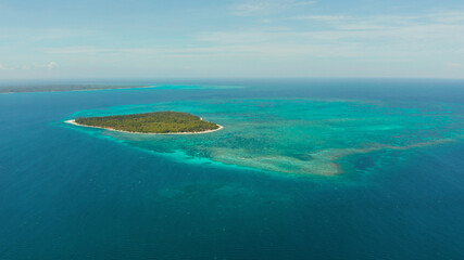 Tropical islands with white beaches and atolls and coral reef, aerial view. Summer and travel vacation concept.