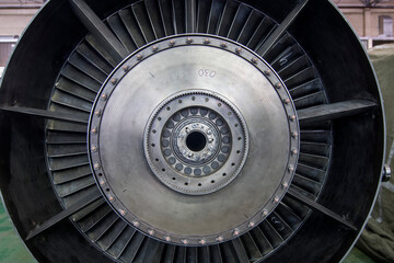 The blades of a gas turbine engine at the factory in the process of its creation, detail.
