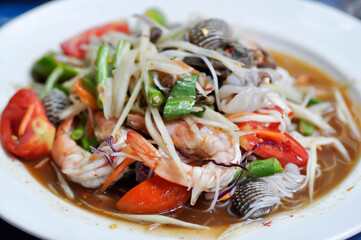 papaya salad, som tam or spicy shrimp and shell salad