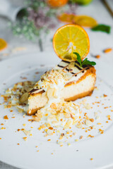 Cheesecake on a white plate in a restaurant serving