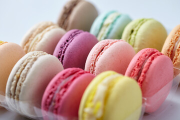 tasty macaroons on the white