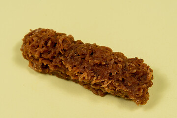 typical Brazilian coconut jam in yellow backgrond