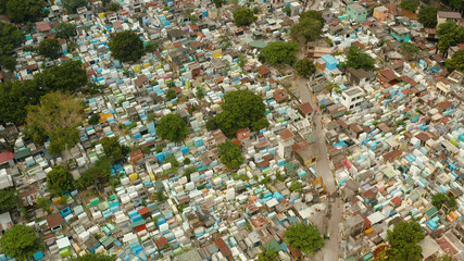 The northern cemetery in Manila from above, a tourist place where local poor people live among the...