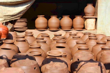 Fototapeta na wymiar Pots drying at Kumbharwada, Mumbai. Spread across 22-acres, it' one of the largest community of potters in Mumbai using traditional and indigenous methods