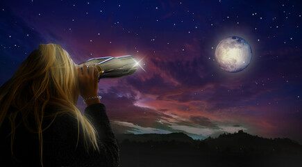 Woman watching or observe the full moon and the stars - astronomy