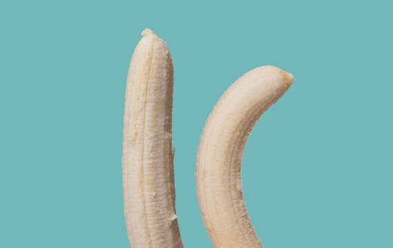 Straight versus curved banana, visual concept of various shaped penis, curved penis