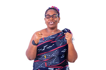 close-up of a beautiful African woman in traditional dress speaking.