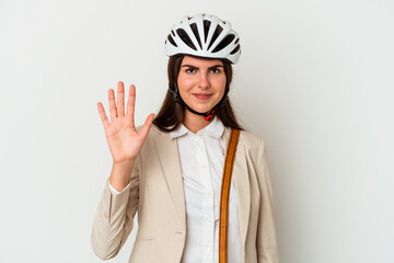 Young caucasian woman riding a bicycle to work isolated on white background smiling cheerful showing number five with fingers.