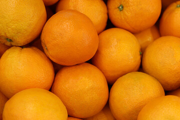 Oranges in a box, orange background
