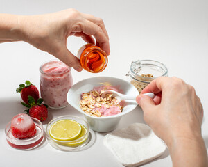 Woman hands making homemade cosmetics.