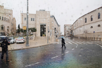center of jerusalem. Central square, administrative buildings, large houses, few people, rain