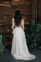 Fototapeta premium Beautiful girl in a light dress. Boho style.