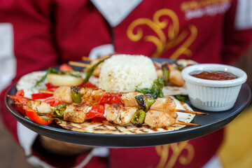 chicken skewer served