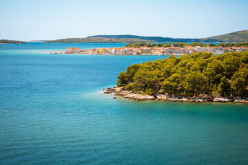 Fototapeta na wymiar Sunny shore of the Adriatic sea near Brodarica coastline, Croatia