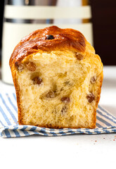 Homemade cake closeup. Sweet cake from yeast dough with raisins. Homemade baking.