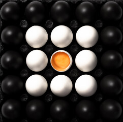 Black and White Eggs. Cultural Diversity Concept Image. Flat Lay Abstract Pattern