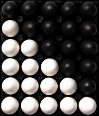 Black and White Eggs. Cultural Diversity Concept Image. Flat Lay Abstract Pattern