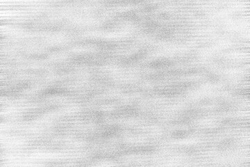 Fototapeta na wymiar An abstract black and white grainy grunge texture background image.