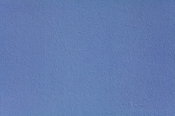 Blue wall, texture, background. The building wall, painted with water-based paint. Smooth (flat) surface in blue color
