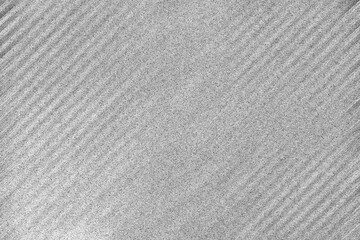 Obraz premium An abstract black and white grainy grunge texture background image.