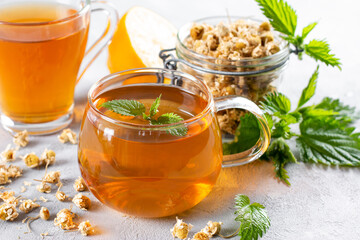 Home herbs tea. Chamomile and herbal tea with nettle, relaxation and detox