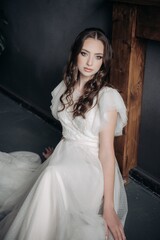 A beautiful bride in a light dress. Boho style.