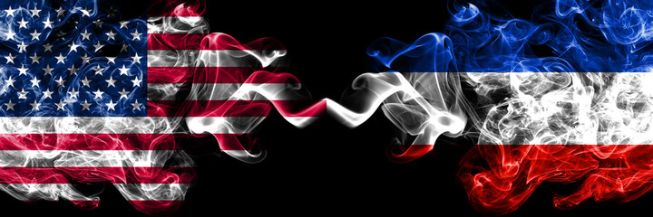United States of America, America, US, USA, American vs Germany, Schleswig Holstein smoky mystic flags placed side by side. Thick colored silky abstract smoke flags.