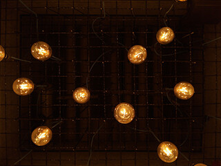 LED bulbs imitates filament electrical lamp with glowing filament