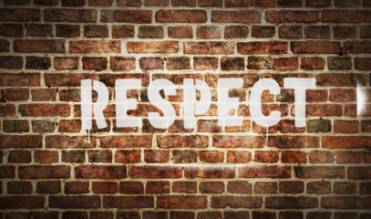 Respect spray painted inscription on the brick wall