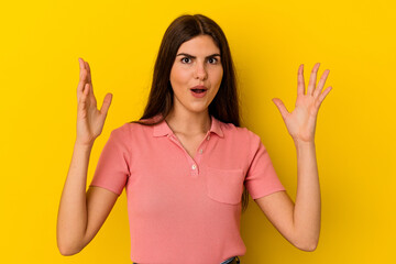 Young caucasian woman isolated on yellow background having an idea, inspiration concept.