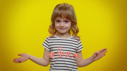 I do not need it, not me, no thanks. Honest little cute blonde kid child pointing fingers himself ask say who me, not guilty. Yellow studio wall background. Teenager children girl lifestyle emotions