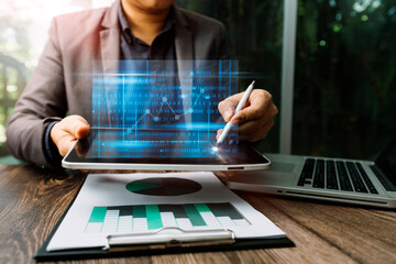 Online shopping. Gold credit card and smartphone in small shopping cart with icon customer network connection. Conceptual of internet shopping and e-commerce on wooden table background