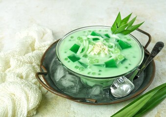 Buko Pandan Salad is a Filipino made with green jelly cubes, tropical palm fruit, tapioca pearls, young coconut in a pandan infused cream. Suitable to be served for breaking the fast in Ramadan.