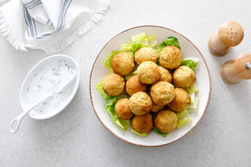 Falafel with greek yogurt sauce tzatziki, mediterranean cuisine