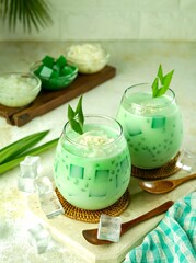 Buko Pandan Salad is a Filipino made with green jelly cubes, tropical palm fruit, tapioca pearls, young coconut in a pandan infused cream. Suitable to be served for breaking the fast in Ramadan.