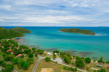 Fototapeta premium Aerial view of beautiful ocean and the island in Sattahip, Chonburi province of Thailand.