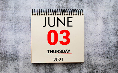 Obraz premium June 3 white cube wooden calendar on vintage wood and white background with Summer day, Copyspace for text.