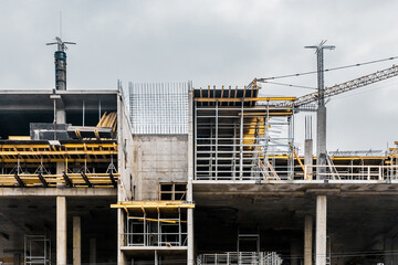 Unfinished new concrete architecture modern urban building at a construction site