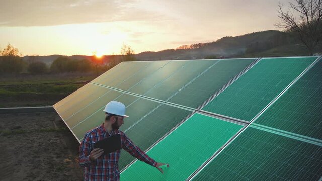Engineer analysing solar panels fault, digital future concept motion graphics